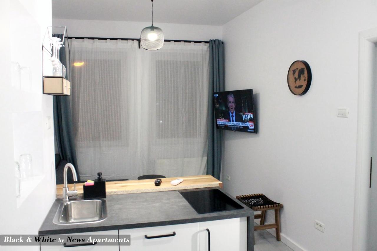 Black & White - News Apartment Букурещ Екстериор снимка