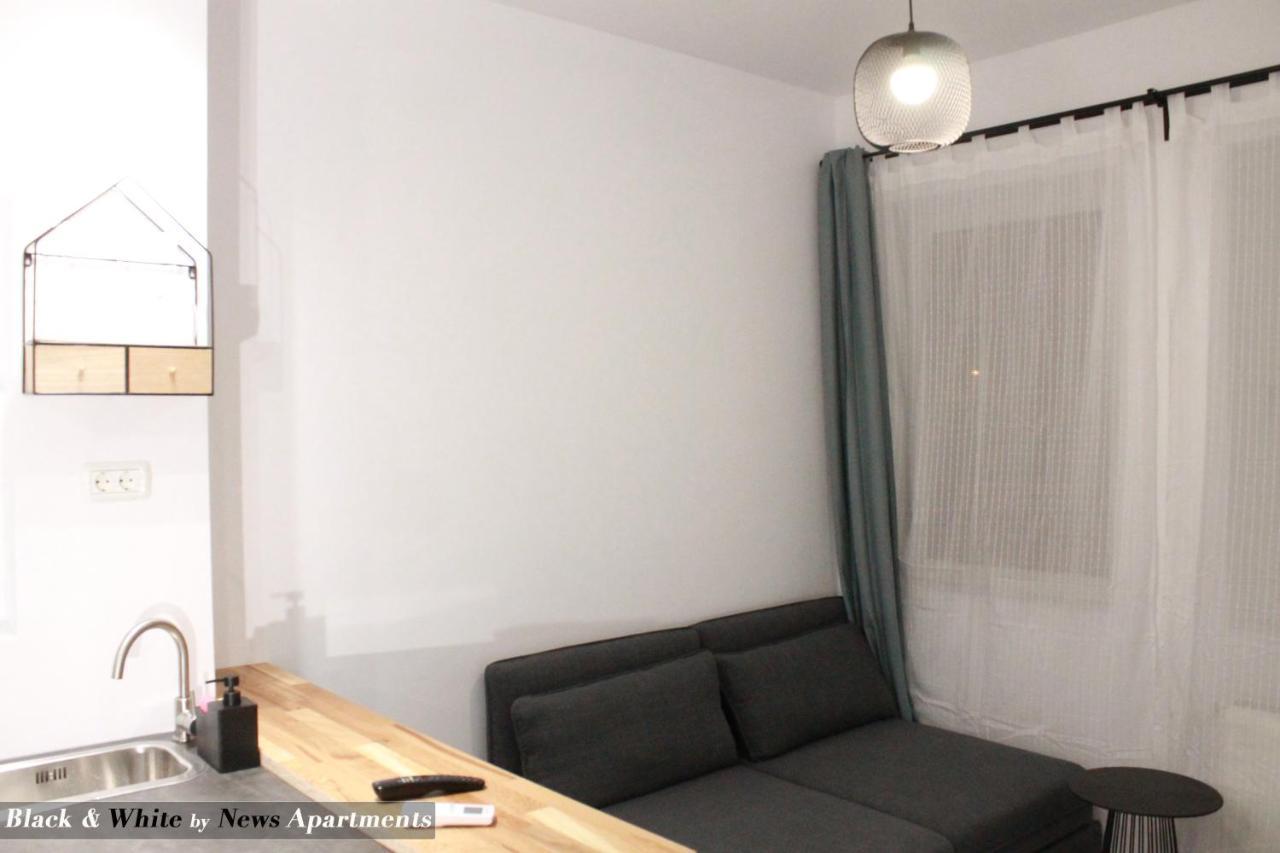 Black & White - News Apartment Букурещ Екстериор снимка
